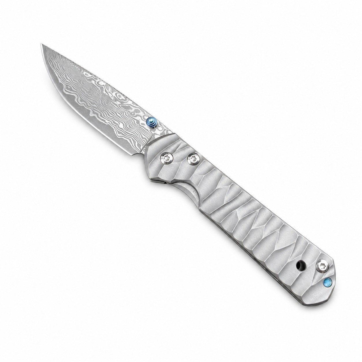 50466-main-white-clean E119 Chris Reeve Big Damascus Small Sand Titanium Handle Folding Knife - Image 1