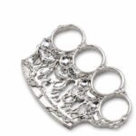 Brass knuckles bracelet with four-finger ring in the shape of a tiger fist and will-o'-the-wisp
